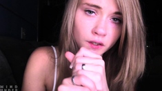 Sensual brunette masseuse babe giving handjob