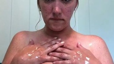 Busty curly brunette with big boobs fucks on couch