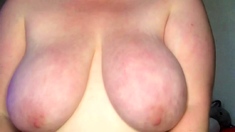 Busty curly brunette with big boobs fucks on couch
